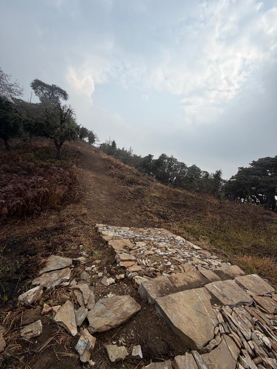 Partially completed stone pavement on a mountain slope