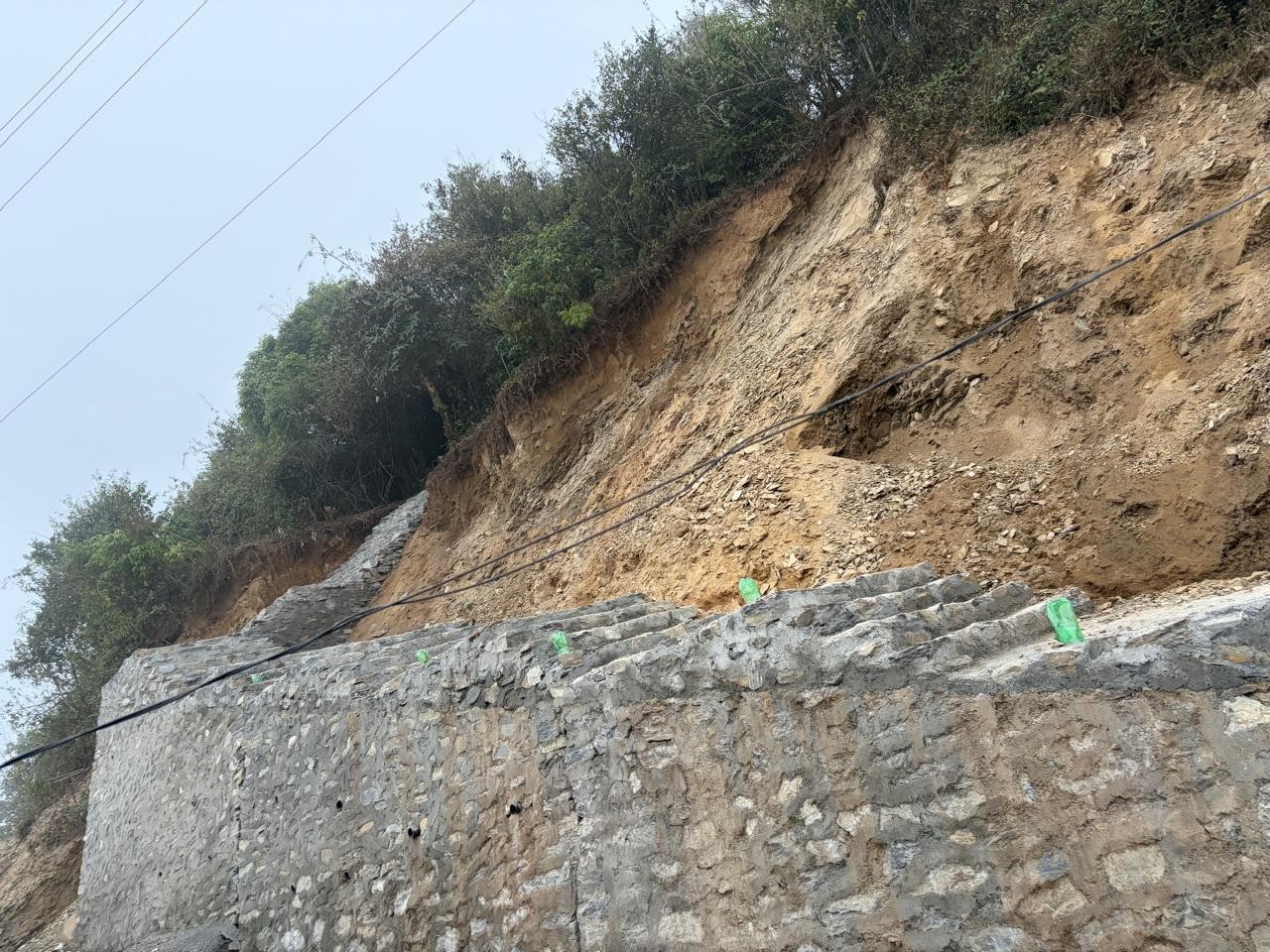 Masonry retaining wall and slope protection works