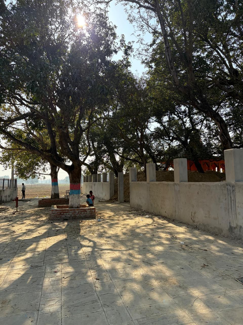 Tourism infrastructure project photo 13: Tree-lined visitor space and compound wall