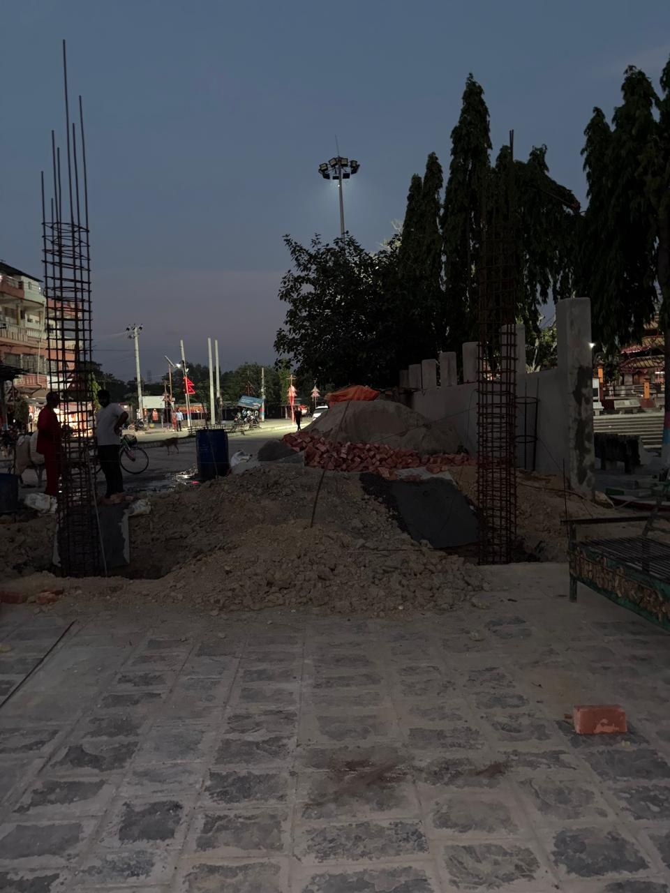Tourism infrastructure project photo 18: Evening construction progress at the site entrance
